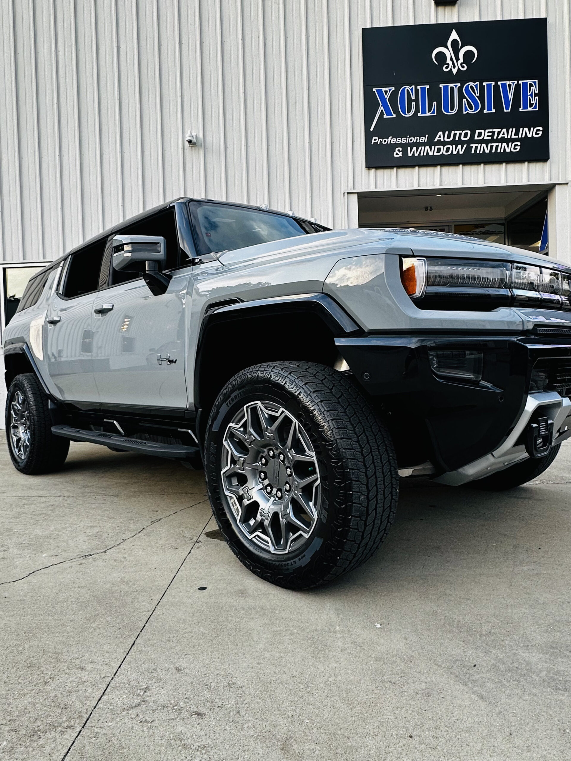 Ceramic-coated GMC Hummer EV outside the Xclusive studio